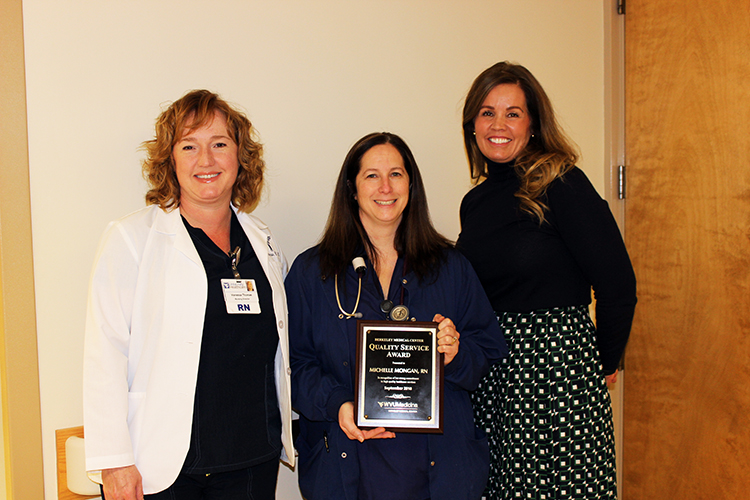 WVU Medicine Berkeley Medical Center’s September Quality Service Award winner is pictured receiving her award. Left to right: Orthopaedics Nurse Director Vanessa Thomas, QSA Winner Michelle Mongan, and Vice President/Chief Nursing Officer Samantha Richards.